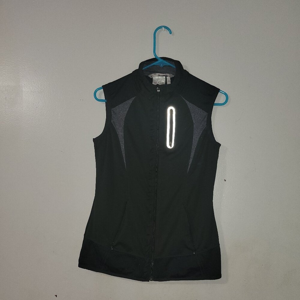 Womens Athleta black vest.
